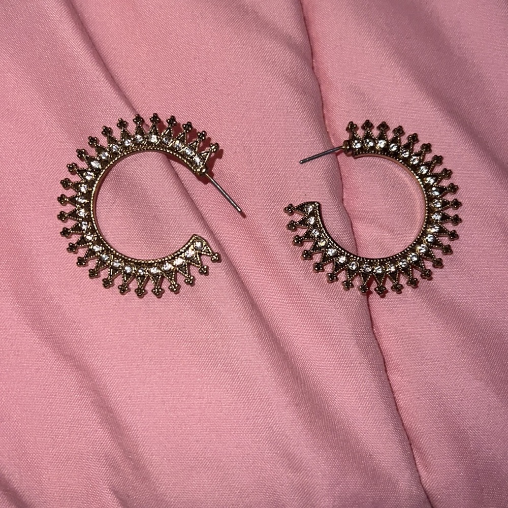 Round hoop spiky gold earrings